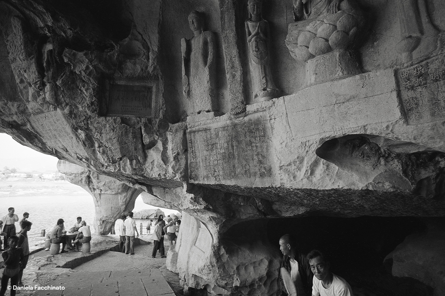 Guilin, Guanxi, China, 1976. Statues of Buddha in a cave alon the Li river